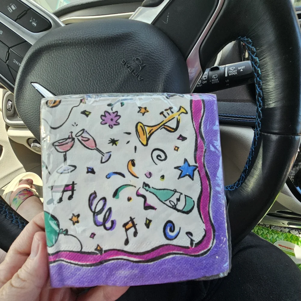 15 packs of various size napkins and themes
